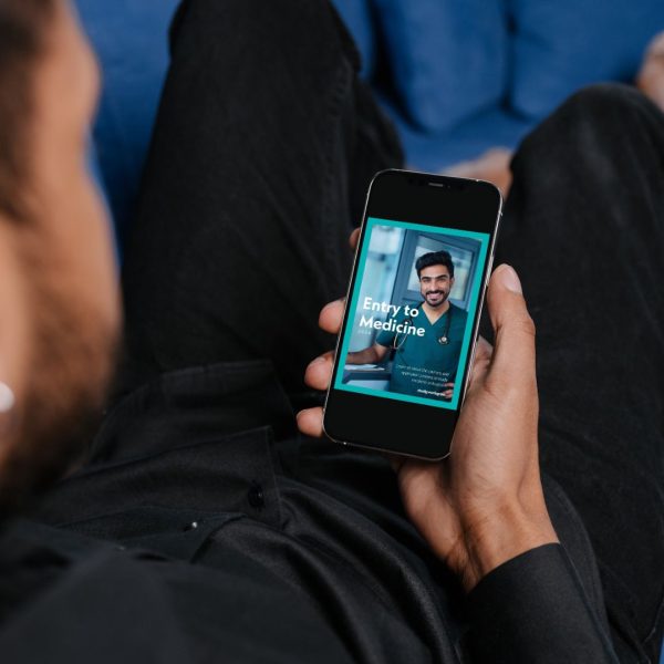 Person reading the Entry to Medicine Guide Australia on a phone